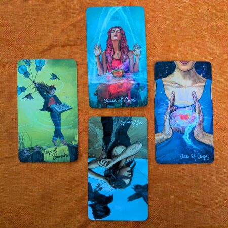 4 tarot cards in a diamond shape